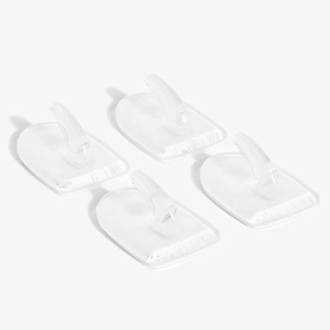 4 crochets adhésifs en plastique transparent - 25x35 mm