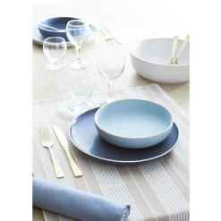 Assiette creuse en faïence bleu turquoise avec liseré crème
