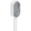 Brosse à cheveux autonettoyante