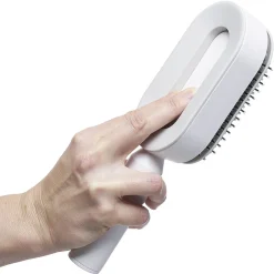Brosse à cheveux autonettoyante