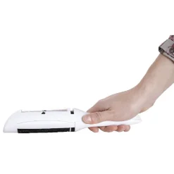 Brosse textile à réservoir