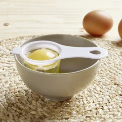 Séparateur blanc d'oeuf plastique bleu ou rose