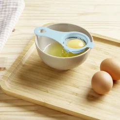 Séparateur blanc d'oeuf plastique bleu ou rose