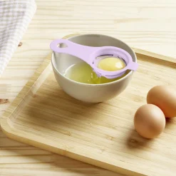 Séparateur blanc d'oeuf plastique bleu ou rose