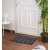 Tapis anti poussière à carreaux noir et blanc
